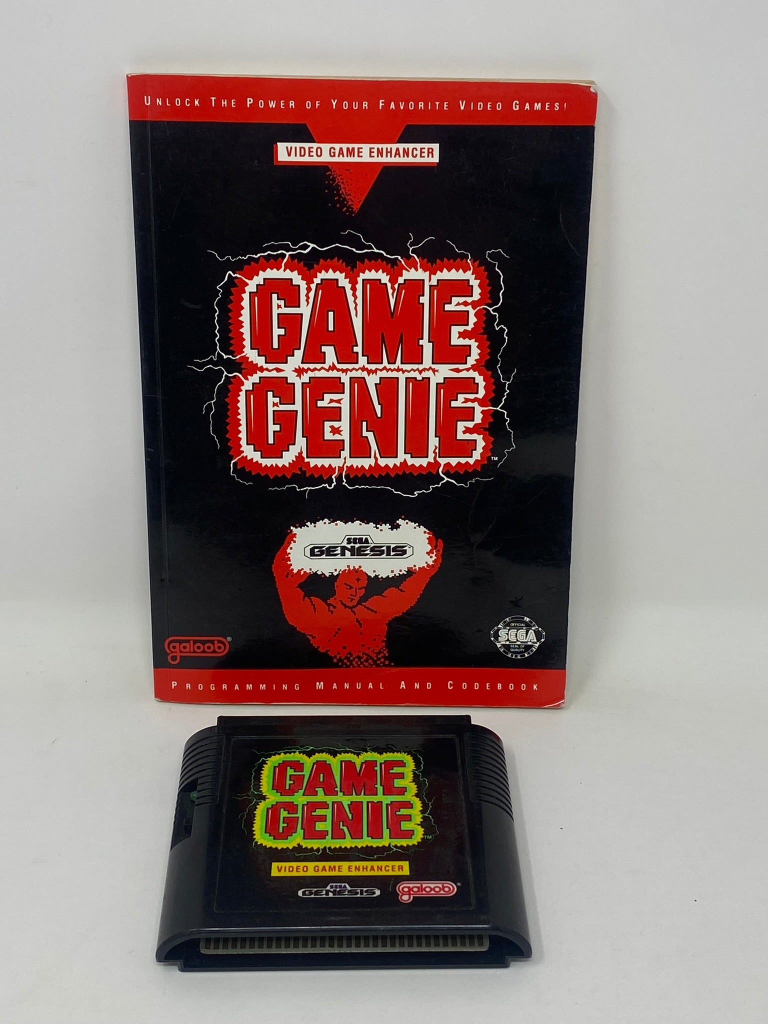 Sega Genesis - Game Genie w/ Code Book